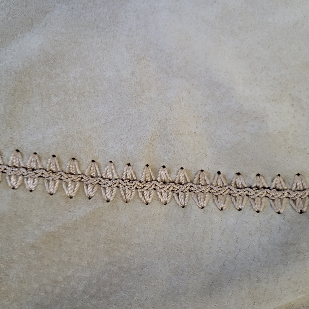 A Two Piece Suede And Crochet Pant Suit View 2